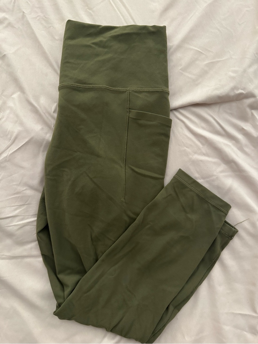 athleta salutation stash with pocket legging